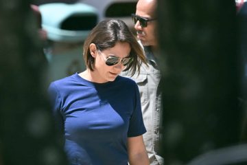 Michelle Bolsonaro ignora Flávio e se junta a apoiador do PL em evento político